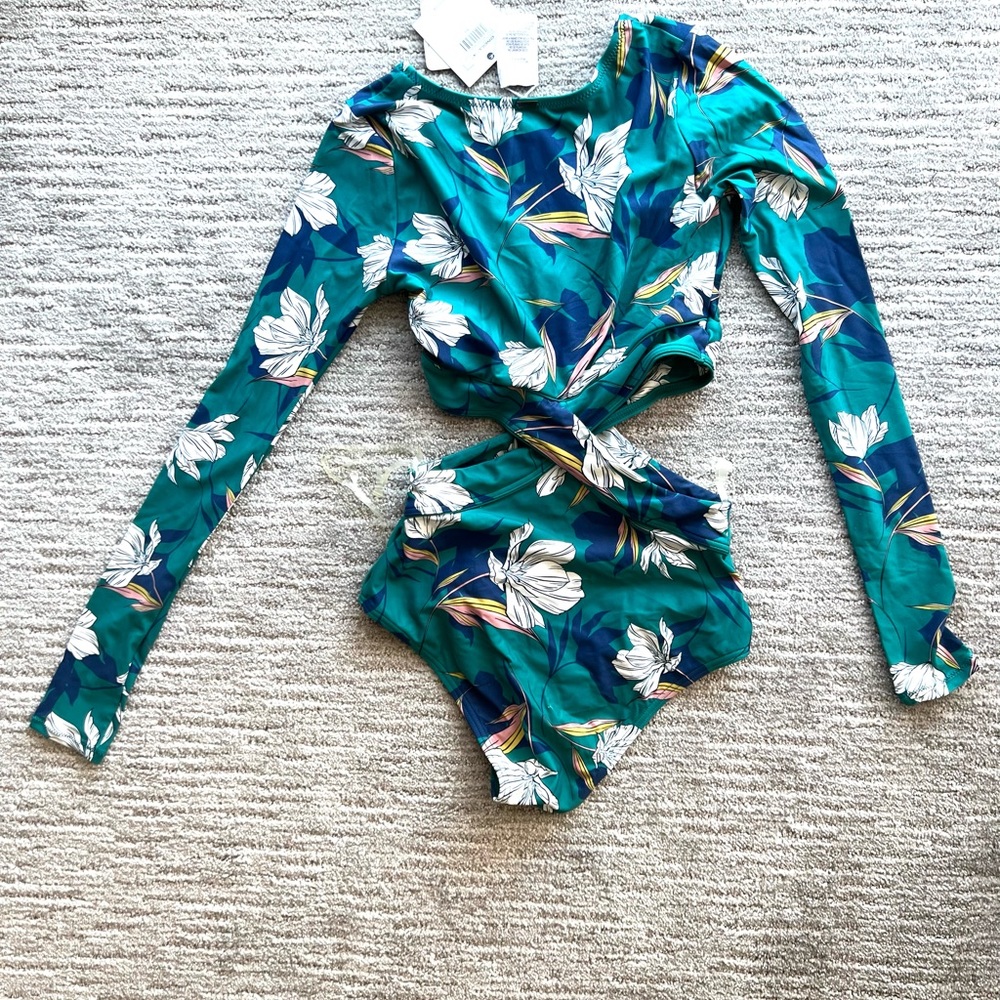 O’Neill forest, green floral, long sleeve rash guard type one piece swimsuit